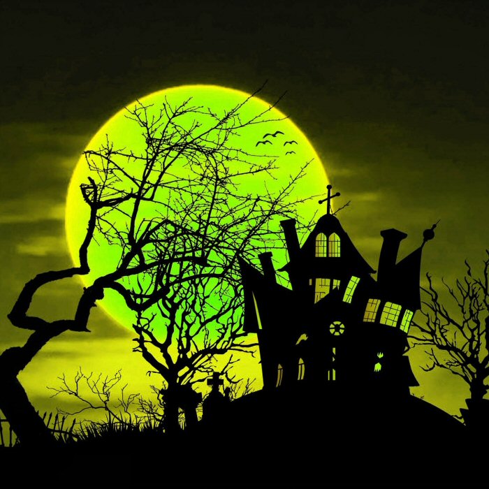 A Haunted House for Halloween on a green background