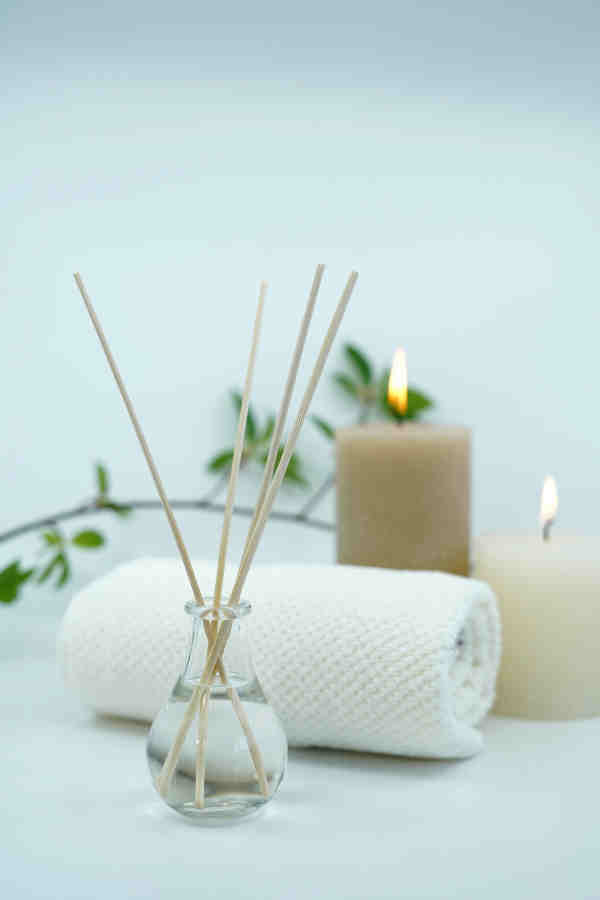 A Spa. Towels, Candles and Diffuser.