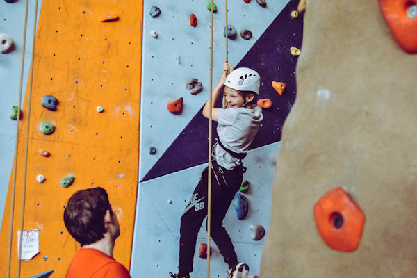 Child on a climbing wall